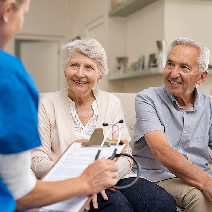 Nurse meeting with patient at home